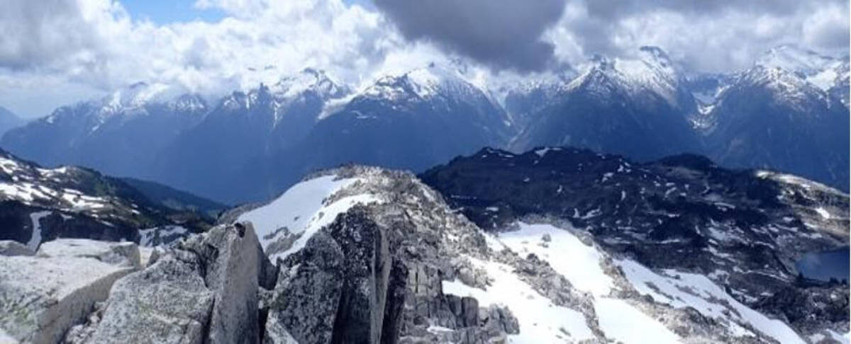 A view of Blanca Peak mountain with dramatic clouds