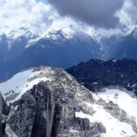 A view of Blanca Peak mountain with dramatic clouds
